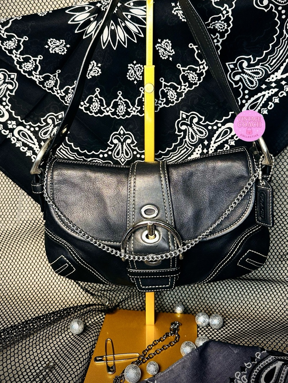 Black mini soho coach buckle